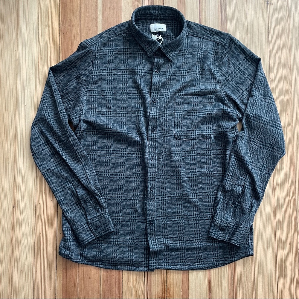 Casual button down shirt. Grey and black plaid. New with tags.